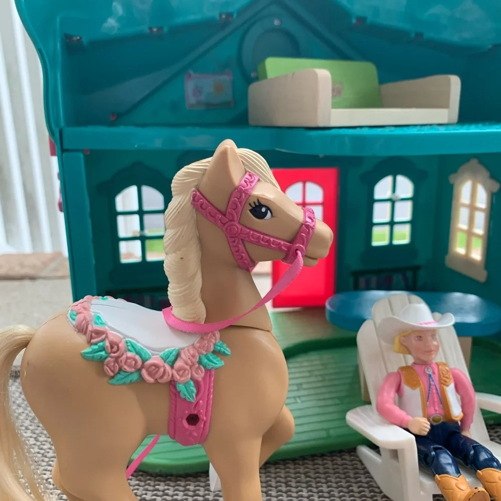 Cowgirl dolls, horse, house, and furniture playset